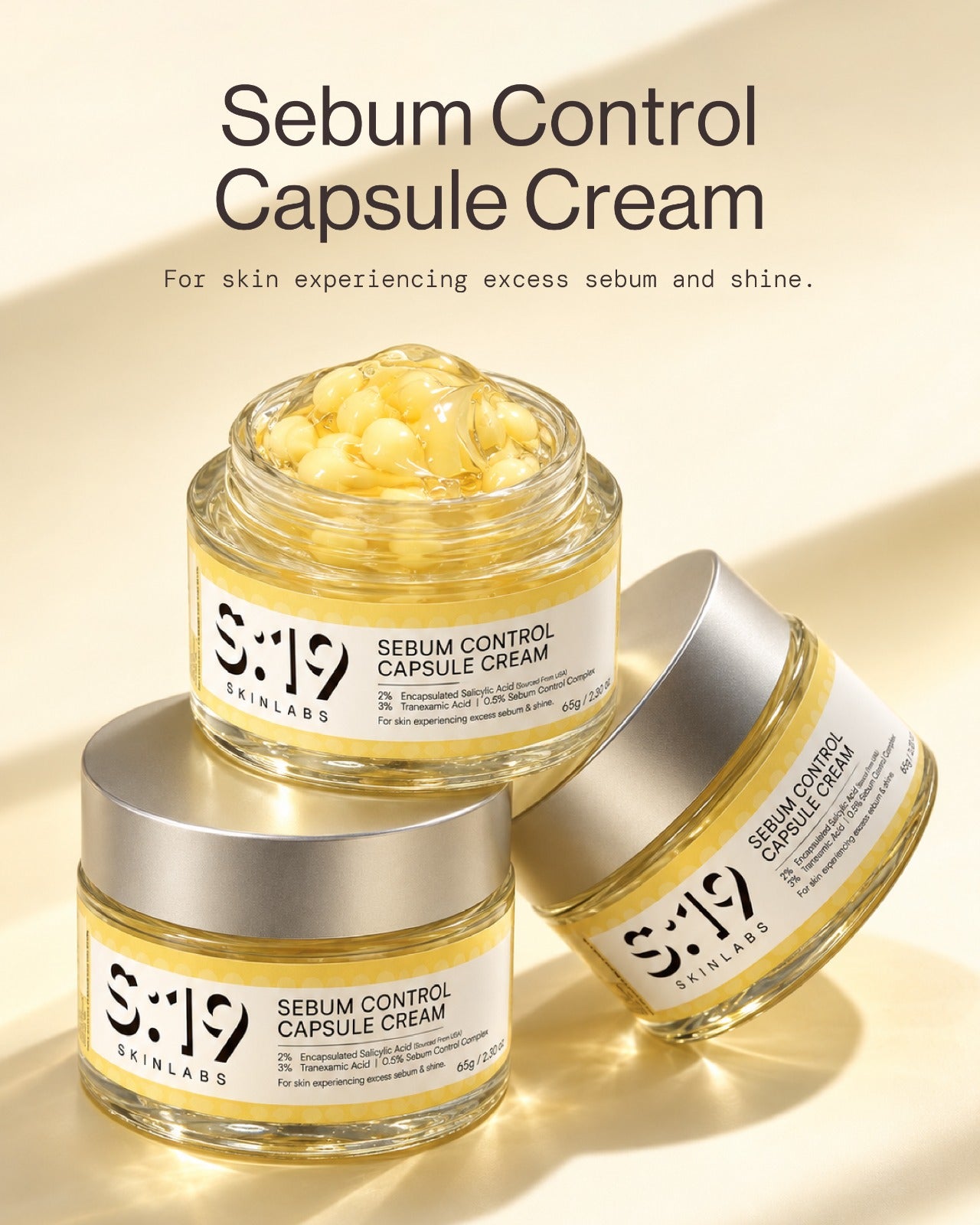 Sebum Control Capsule Cream open jars showing yellow salicylic acid capsules